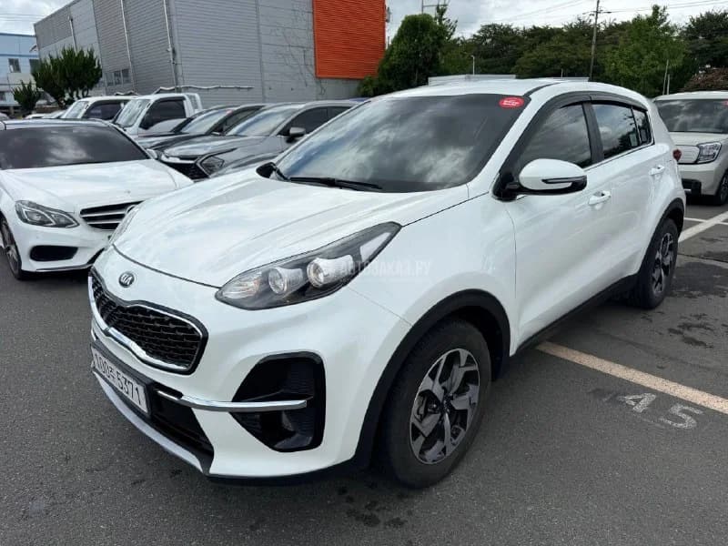 Белая Kia Sportage предыдущего поколения из корейского объявления 31 августа