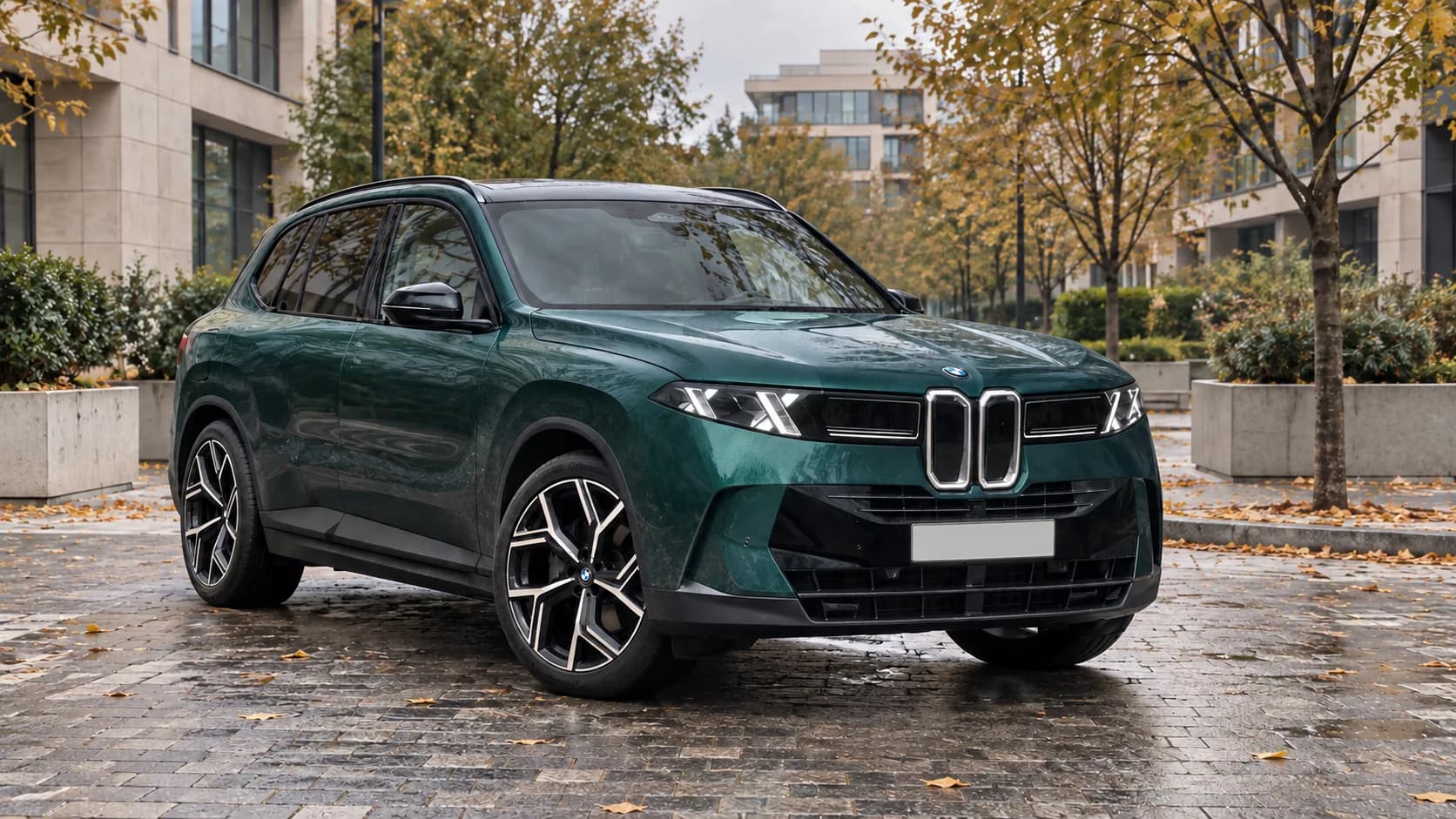 Новый BMW X5 G65 40 xDrive в зелёном цвете: вид спереди в три четверти
